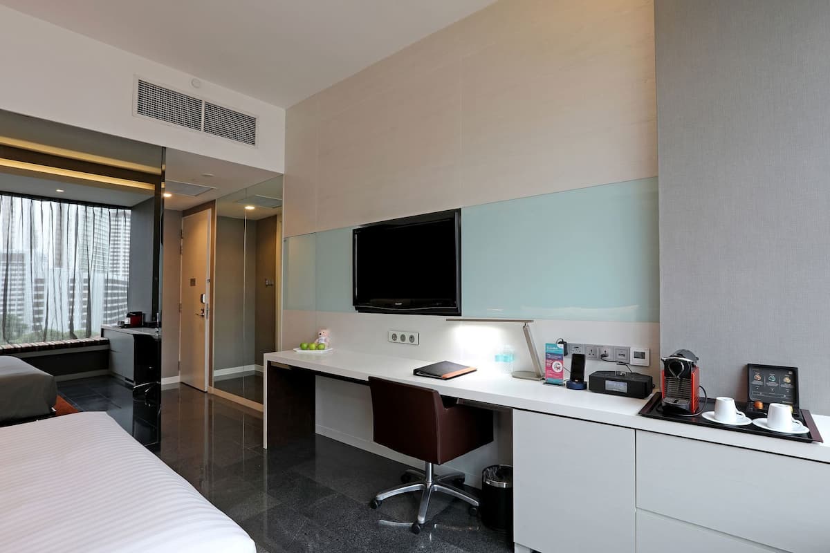 Premium bedding, memory foam beds, in-room safe, desk