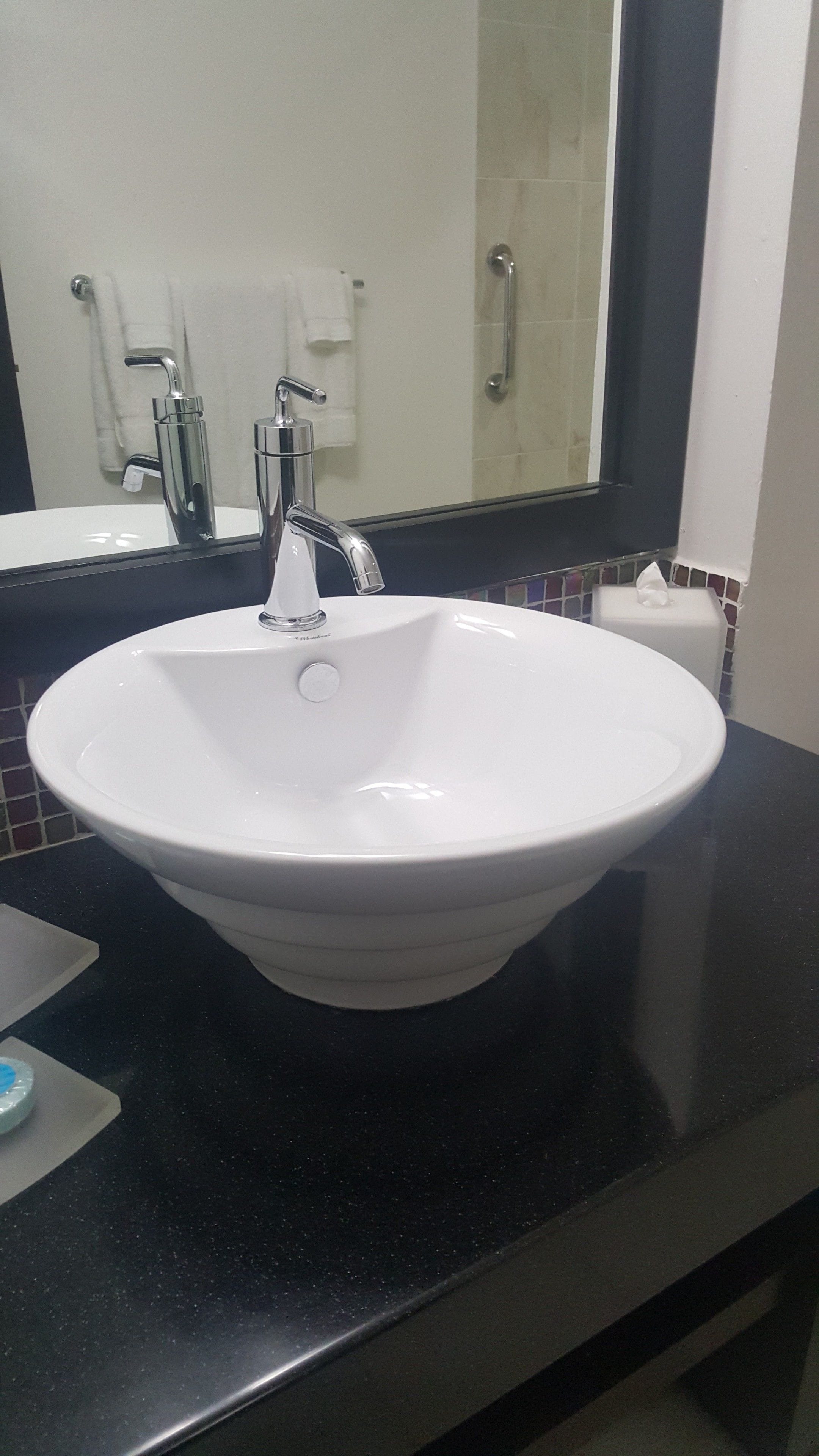 combined shower/bathtub, free toiletries, hair dryer, towels