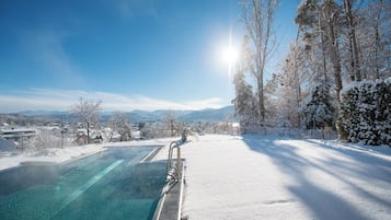 Indoor pool, outdoor pool, pool umbrellas