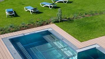 Indoor pool, outdoor pool, pool umbrellas