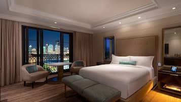 Italiaanse Frette-lakens, luxe beddengoed, pillowtop-bedden, een minibar