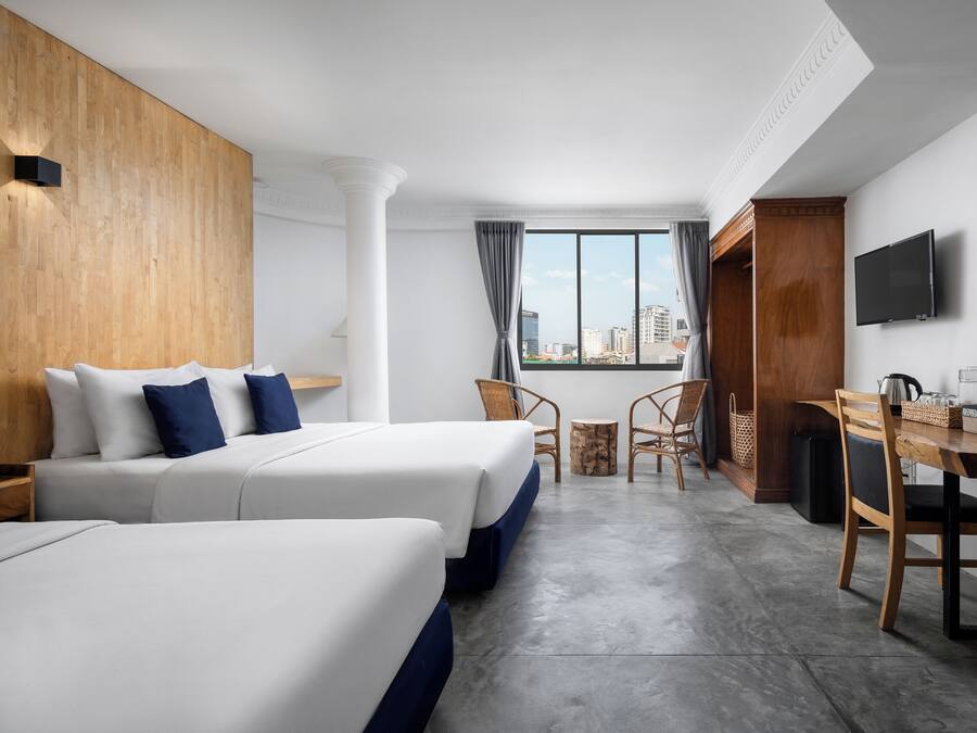 Familien-Suite, Mehrere Betten, barrierefrei, Stadtblick | Hochwertige Bettwaren, Minibar, Zimmersafe, individuell dekoriert