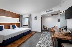 Ropa de cama de alta calidad y minibar 