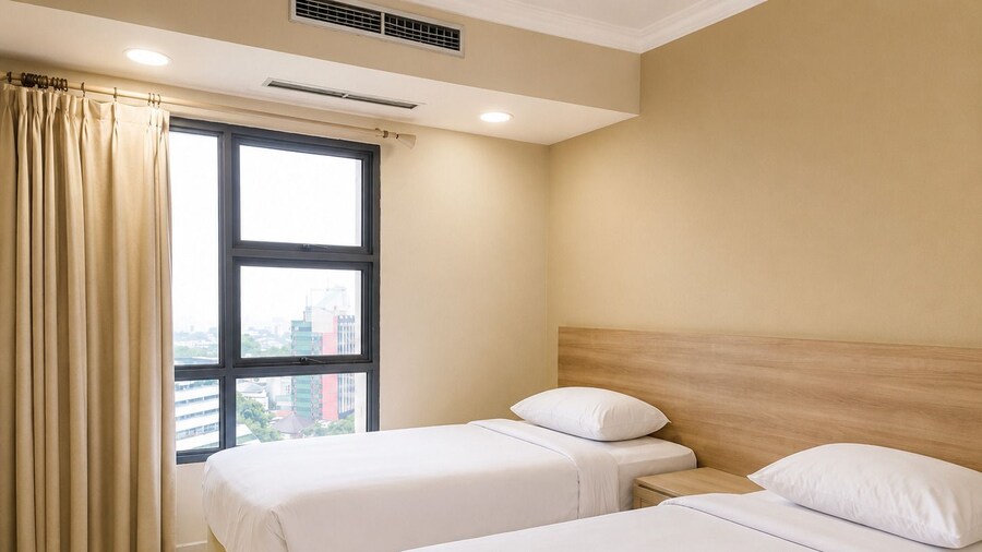 Grand Tropic Suites Hotel