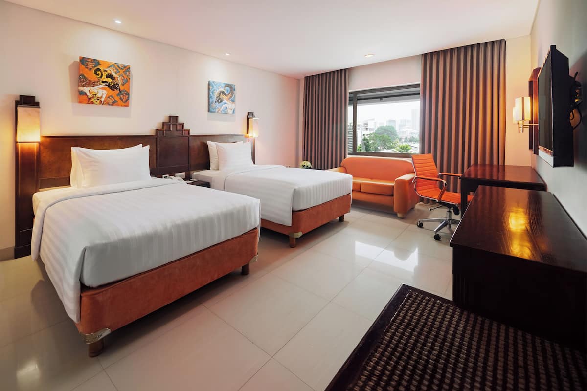 Minibar, desk, bed sheets