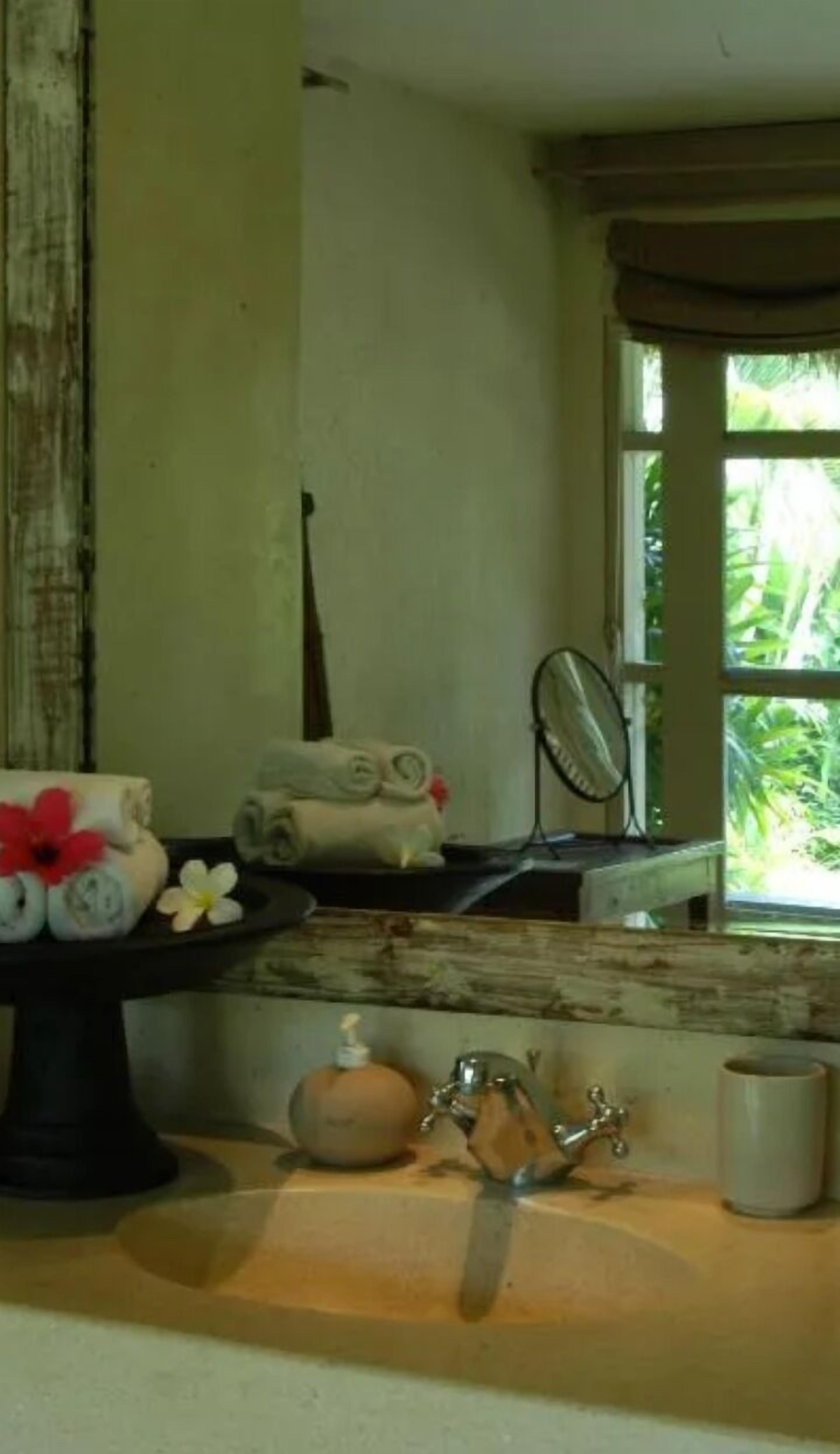 deluxe double room | bathroom | rainfall showerhead, free toiletries, hair dryer, bathrobes