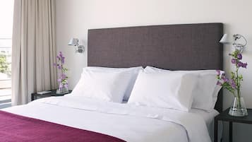 Ropa de cama de alta calidad y minibar