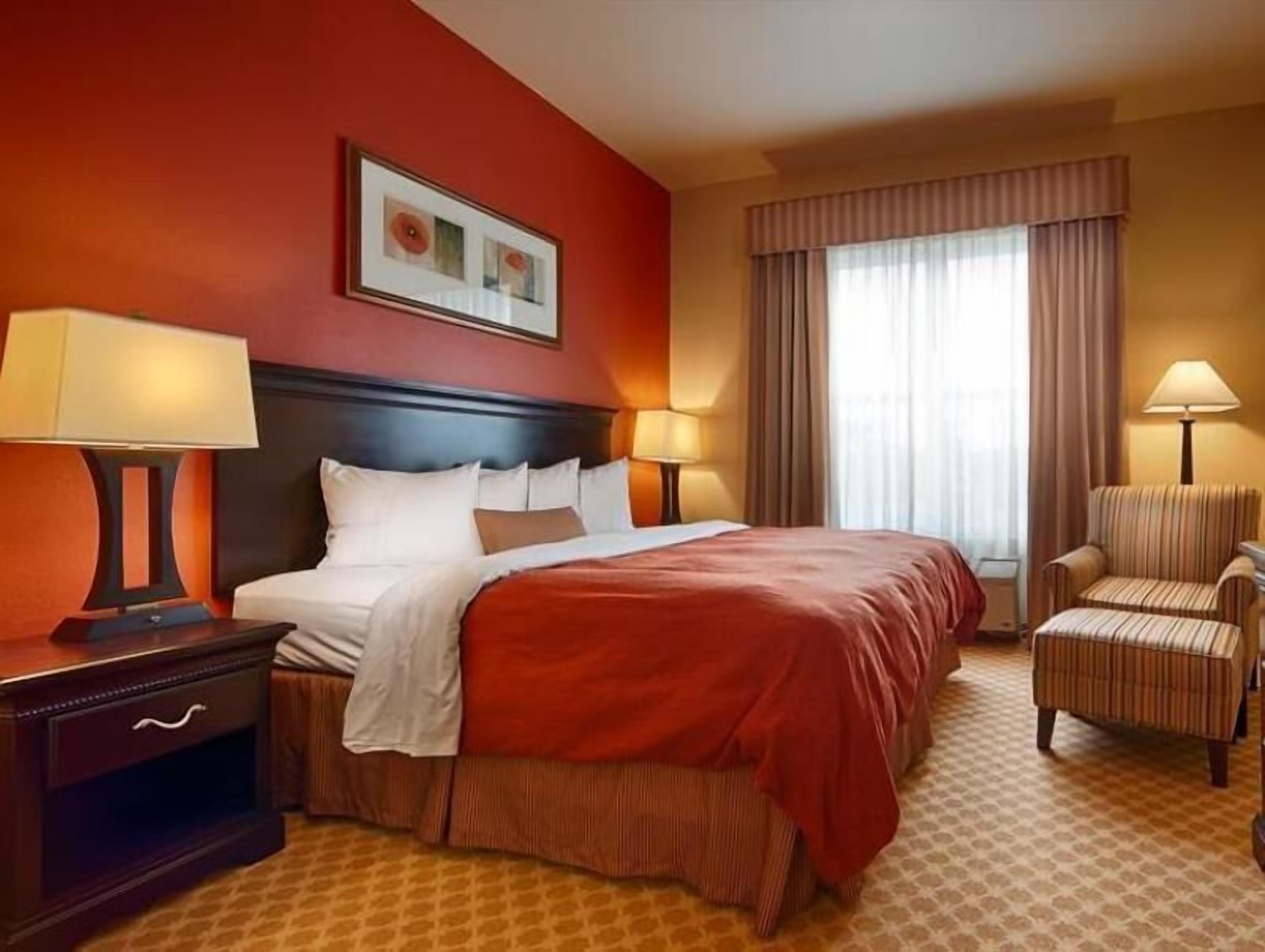 Premium bedding, down comforters, desk, laptop workspace