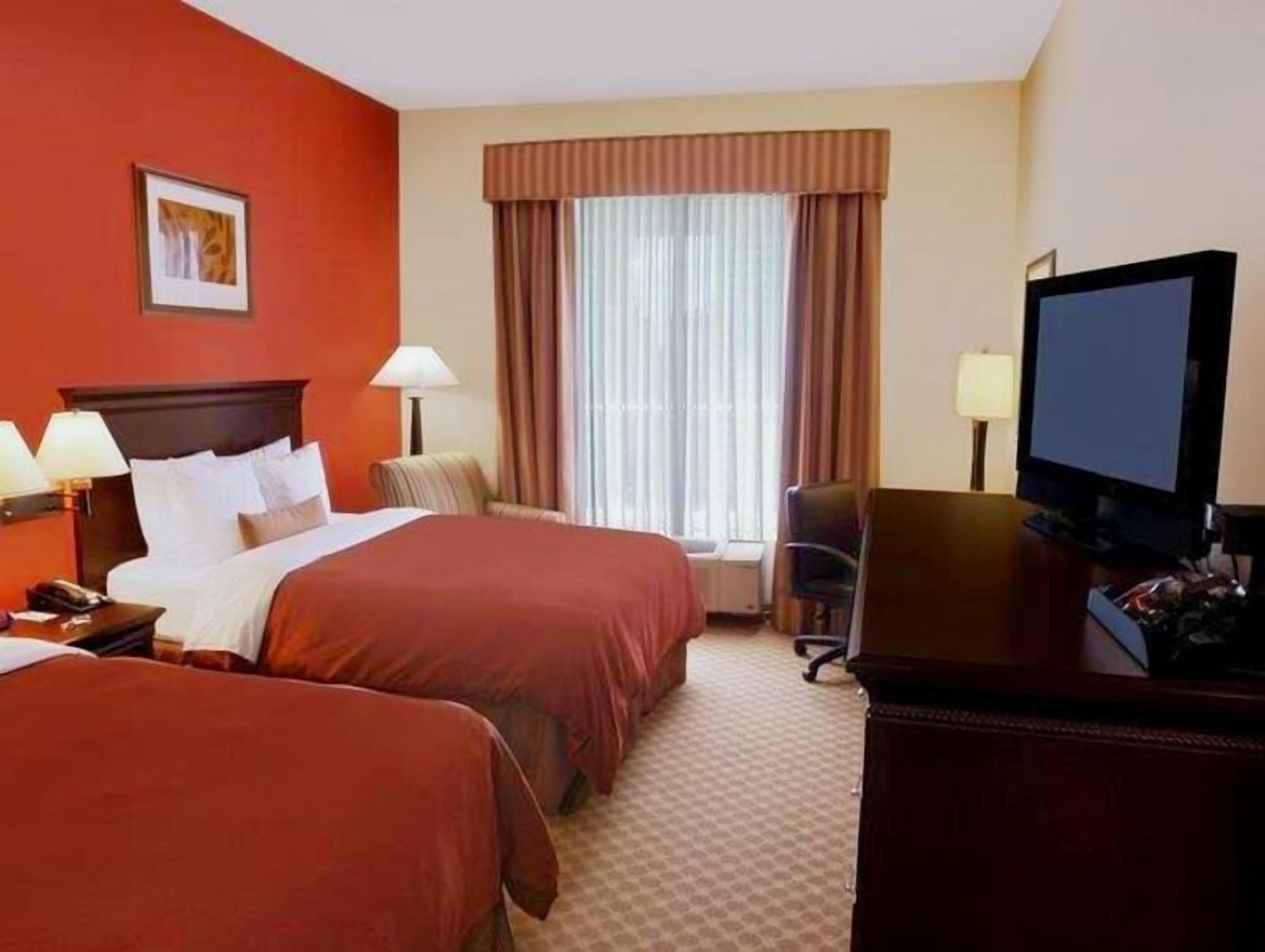 Premium bedding, down comforters, desk, laptop workspace