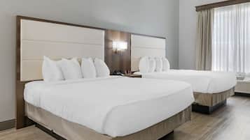 Premium bedding, down comforters, desk, laptop workspace