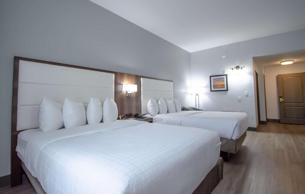 Premium bedding, down comforters, desk, laptop workspace