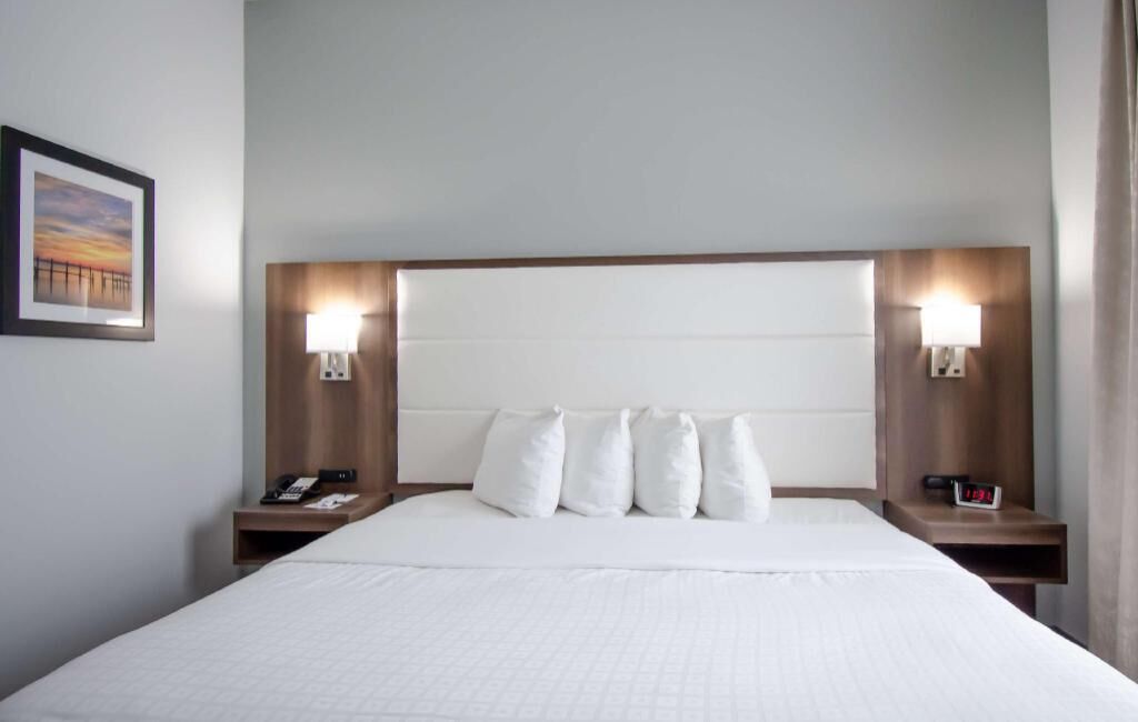 Premium bedding, down comforters, desk, laptop workspace