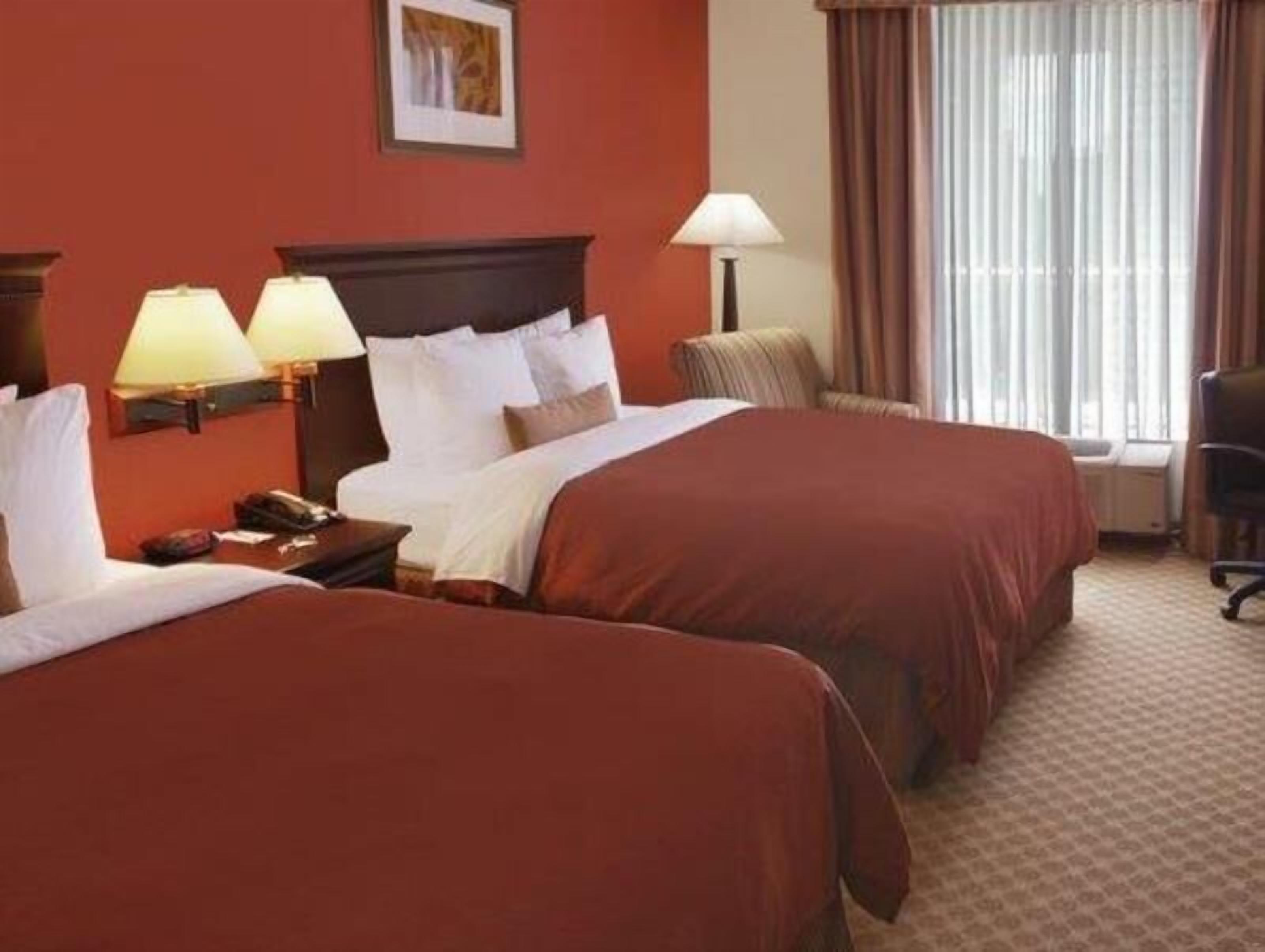 Premium bedding, down comforters, desk, laptop workspace