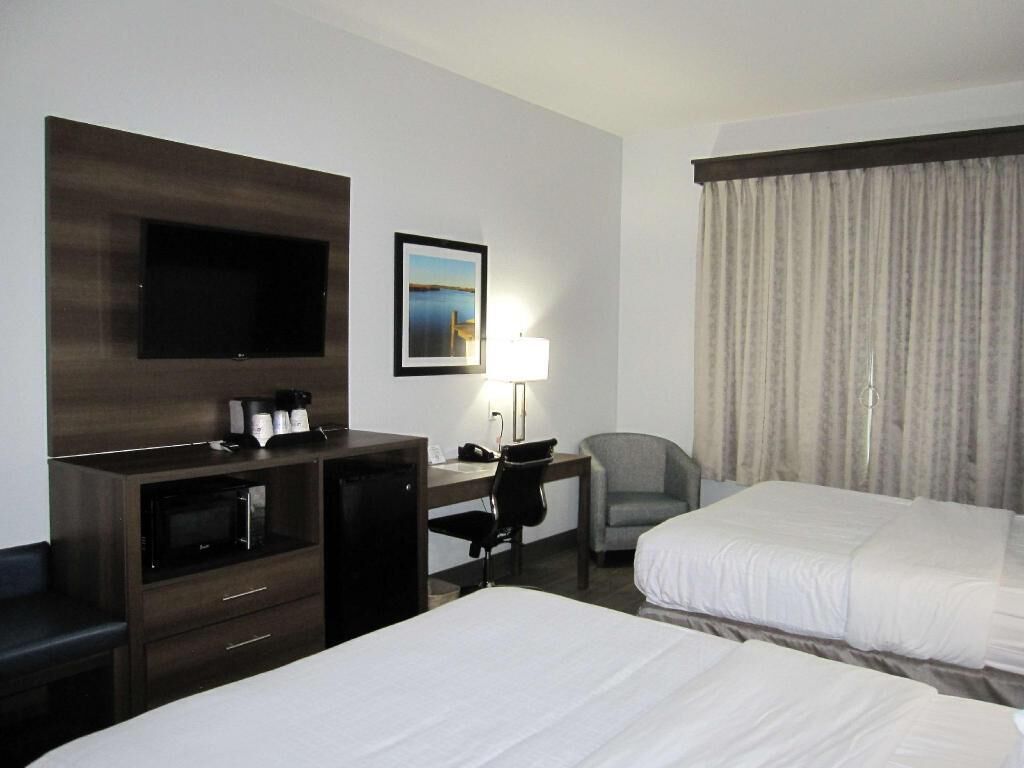 Premium bedding, down comforters, desk, laptop workspace