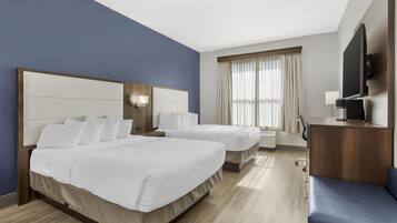 Premium bedding, down duvets, desk, laptop workspace