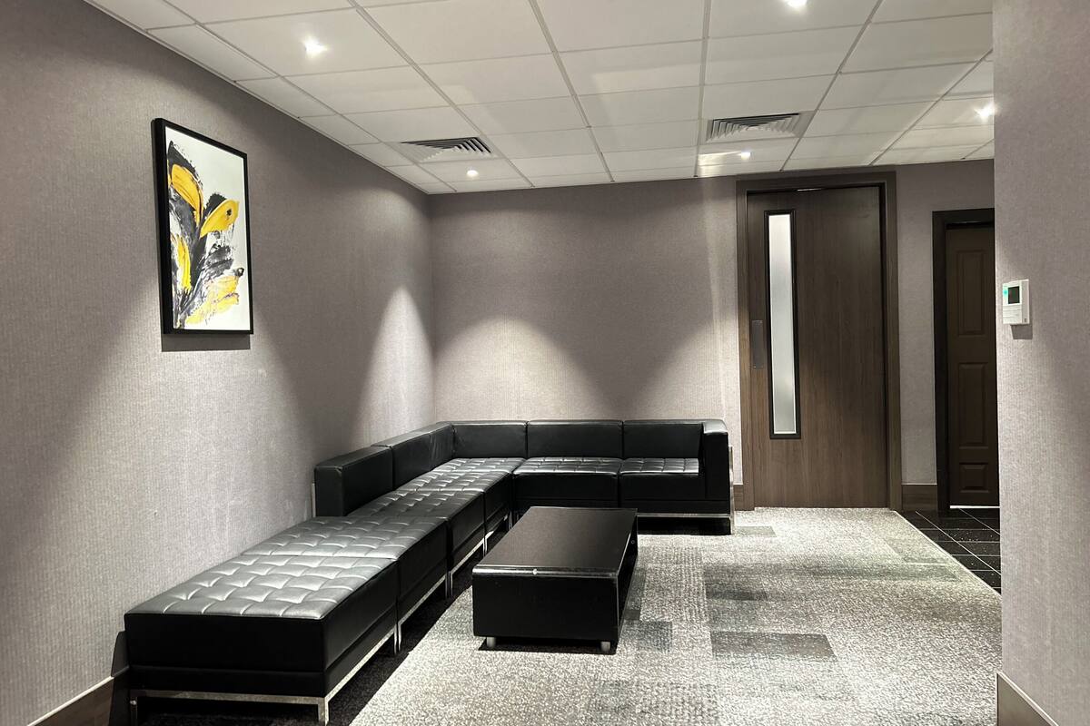 suite, 2 bedrooms | living area | flat-screen tv