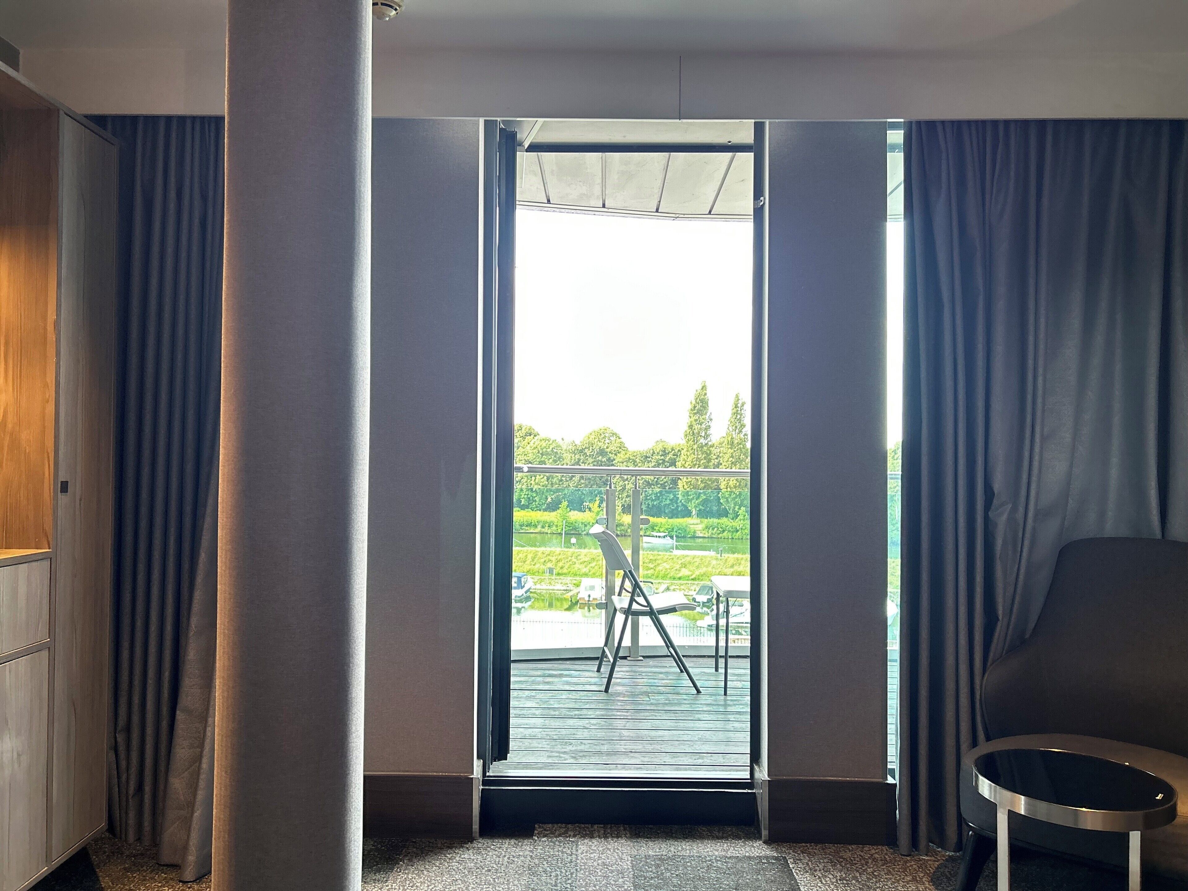 Suite, 1 King Bed, Balcony | Living area | Flat-screen TV