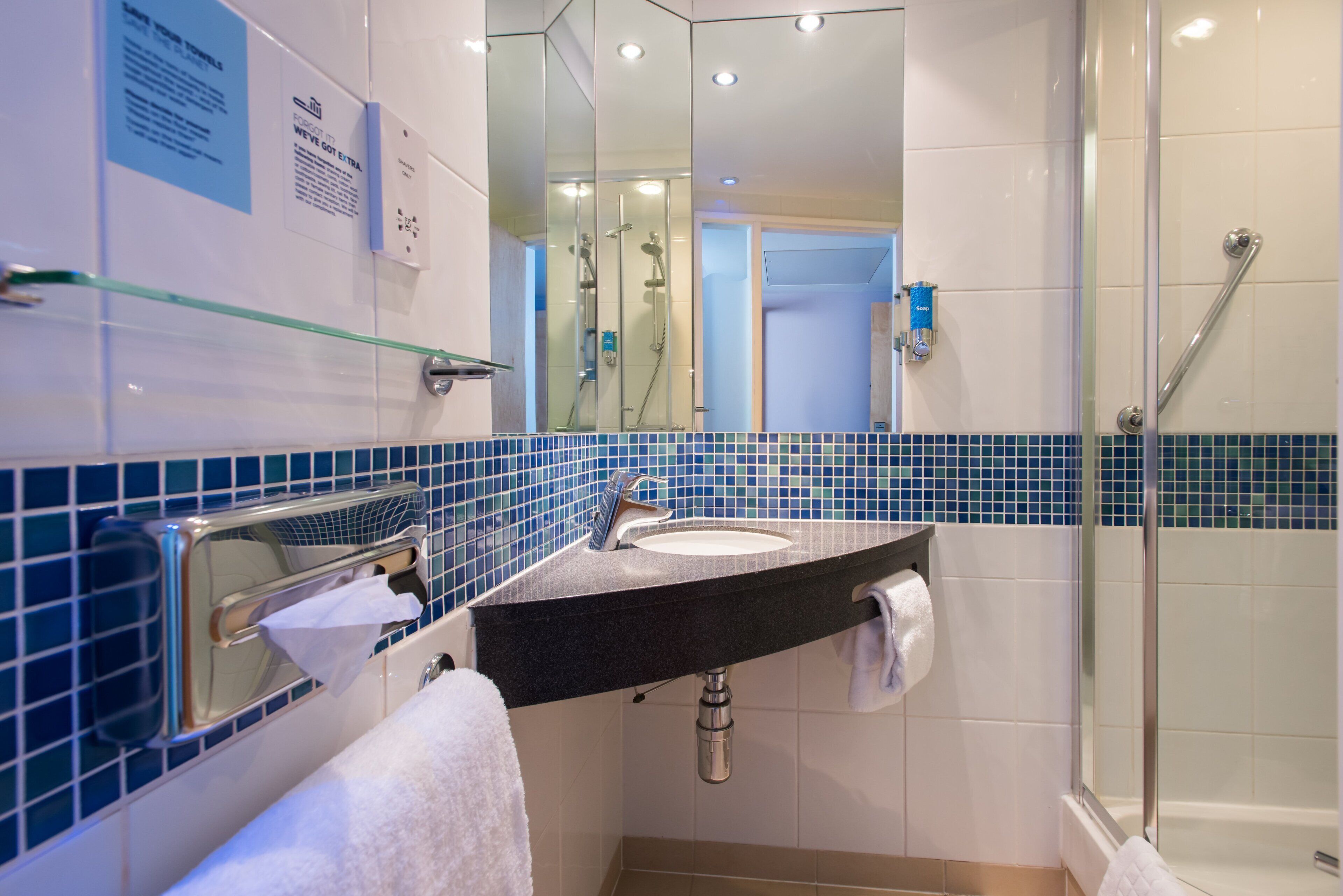 shower, free toiletries, hair dryer, towels