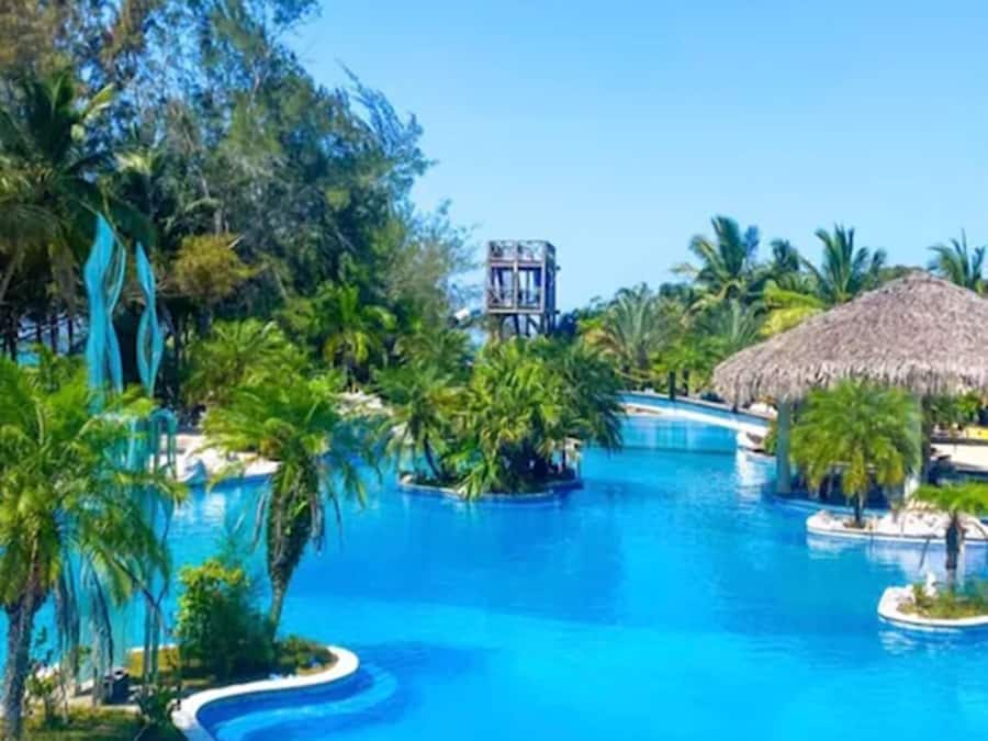 3 outdoor pools, open 9:00 AM to 9:00 PM, pool umbrellas, pool loungers