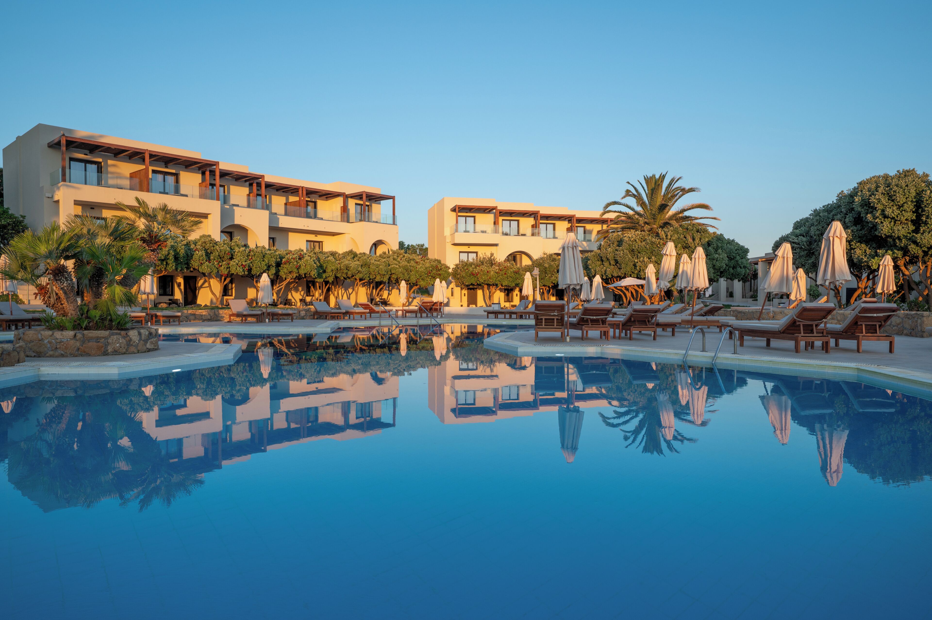 Seasonal outdoor pool, pool umbrellas, pool loungers