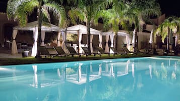 Seasonal outdoor pool, open 10:00 AM to 6:00 PM, sun loungers