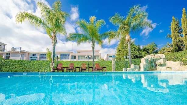 Outdoor pool, pool umbrellas, pool loungers
