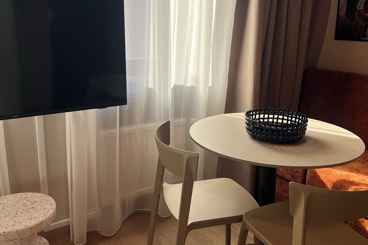 Blackout drapes, soundproofing, iron/ironing board (on request)