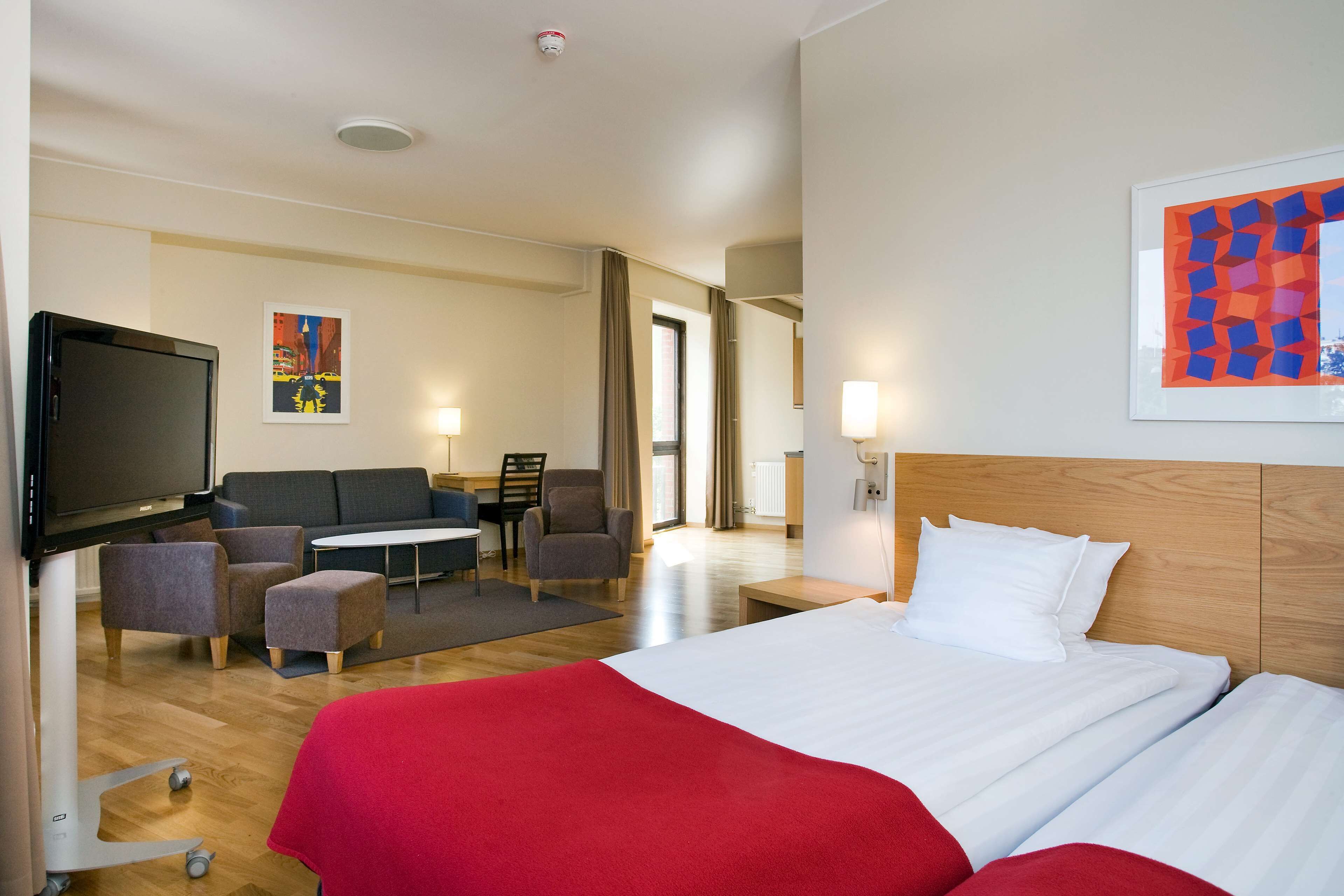 family room, kitchenette (superior) | 1 bedroom, blackout curtains, soundproofing, iron/ironing board