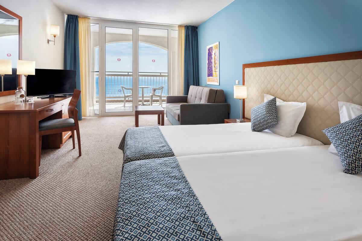 standard room, multiple beds, sea view | beach/ocean view