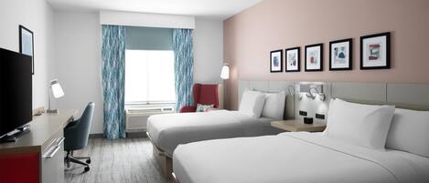 A hotel room with two beds, a desk with a TV, a chair, a desk lamp, and a window with curtains.