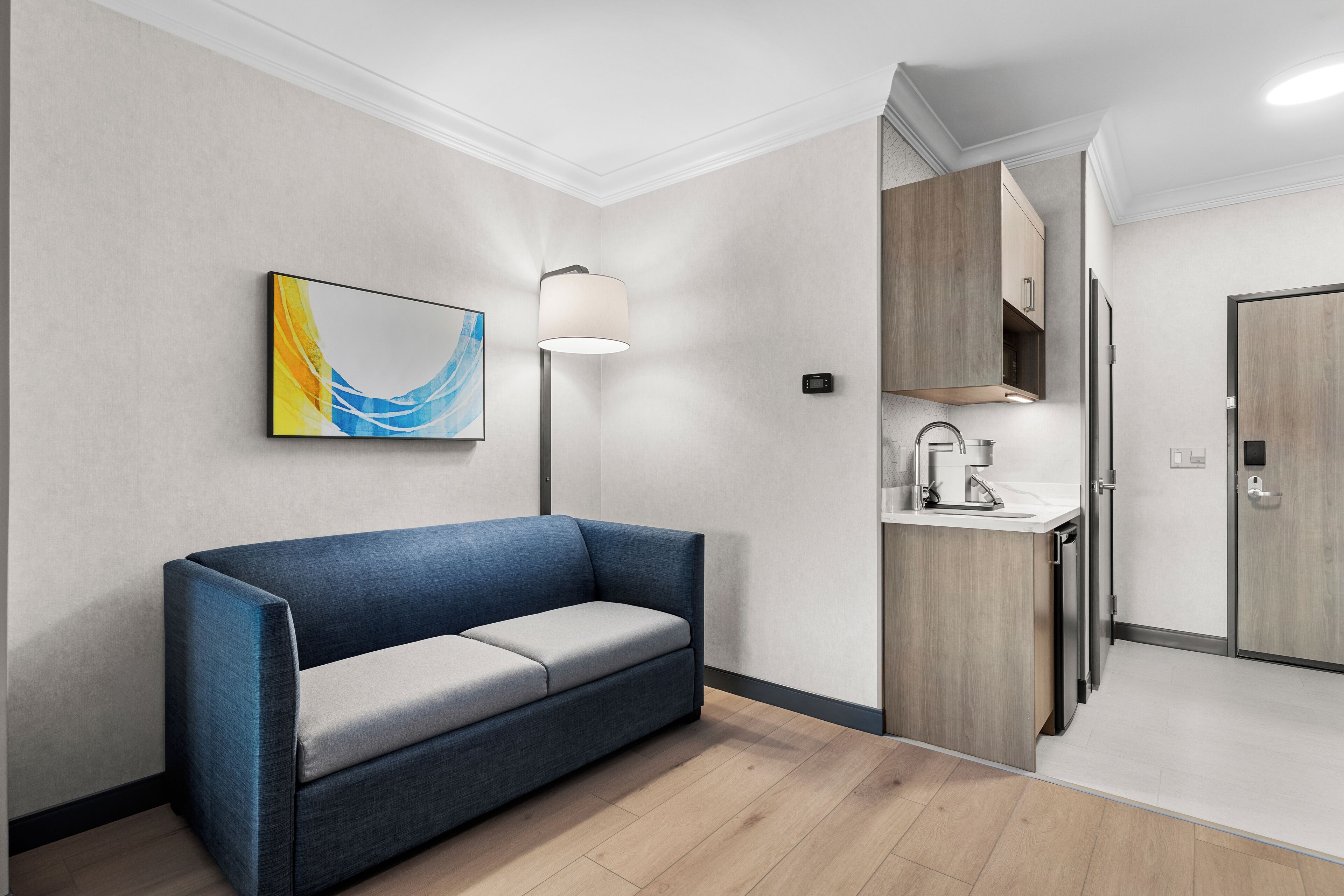 Suite, 1 King Bed | Desk, blackout curtains, iron/ironing board, cots/infant beds