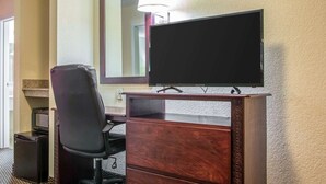 Tabla de planchar con plancha, wifi gratis y ropa de cama 