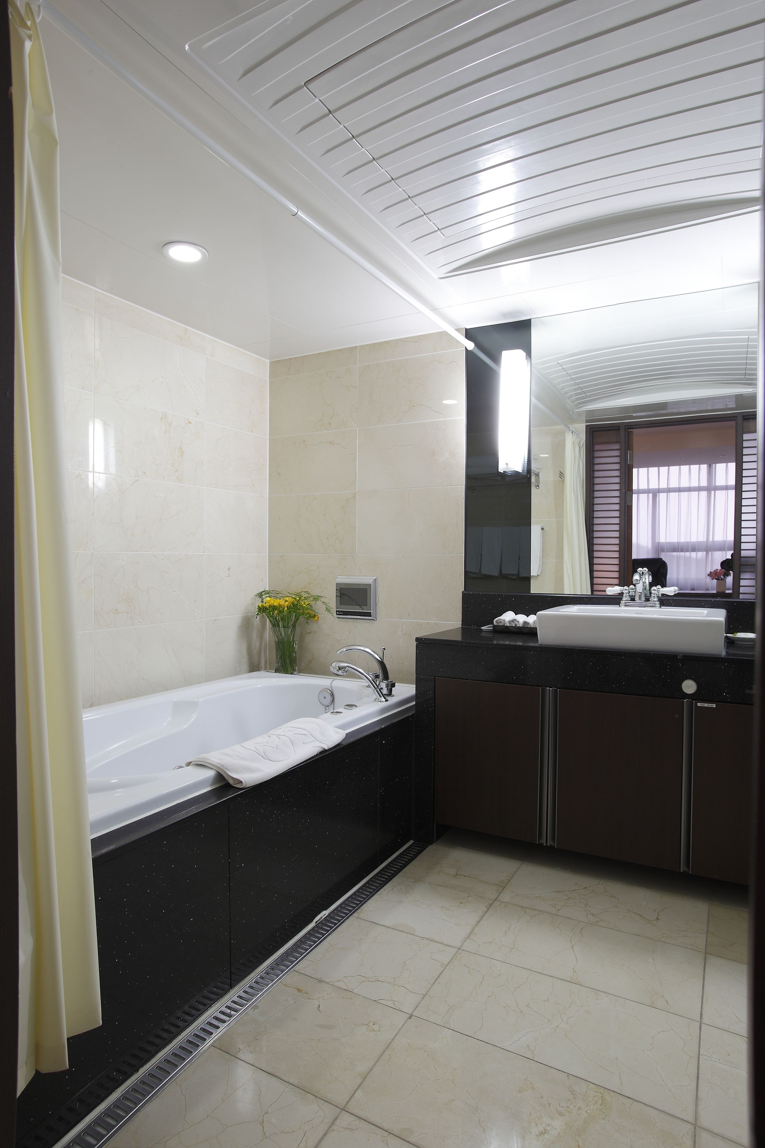 suite, 1 queen bed, hot tub | bathroom | combined shower/bathtub, free toiletries, hair dryer, bathrobes