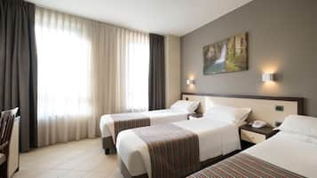 Triple Room, Multiple Beds | Hypo-allergenic bedding, minibar, in-room safe, individually decorated