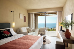 Junior Suite Sea View and Private Garden | 1 bedroom, in-room safe, free WiFi, bed sheets