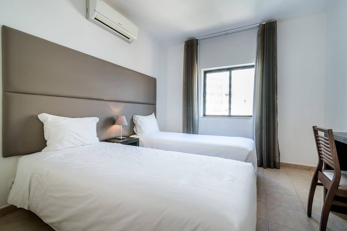 Blackout curtains, soundproofing, iron/ironing board (on request)