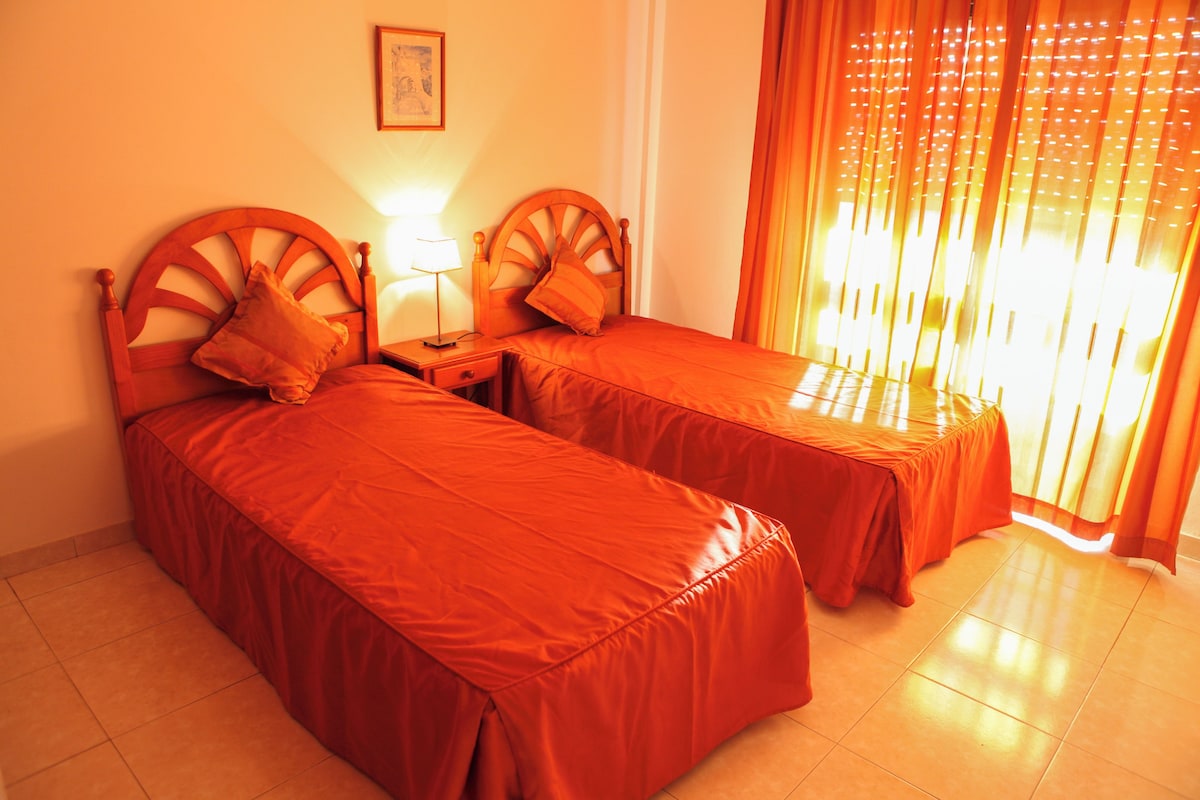 Blackout drapes, soundproofing, iron/ironing board (on request)