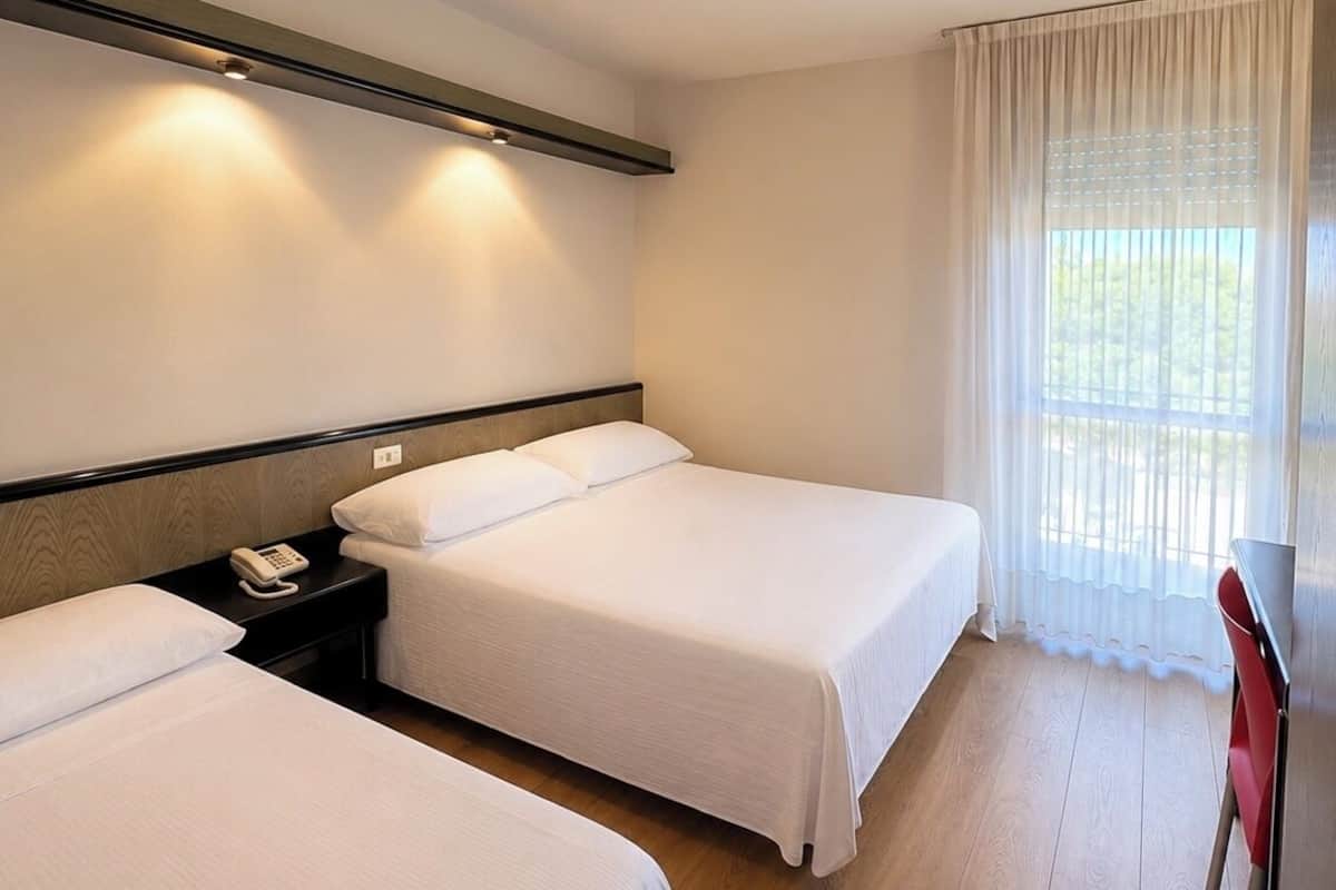 Standard Triple Room | Hypo-allergenic bedding available, in-room safe, desk, laptop workspace