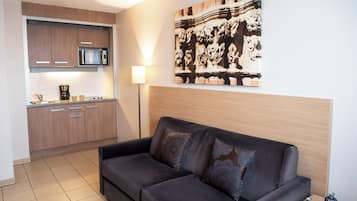 Apartamento, 1 quarto | Roupas de cama premium, individualmente decorados