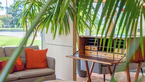 A modern living room with a sofa, a coffee table, and a wooden cabinet. - Residhome Toulouse Occitania (Toulouse)