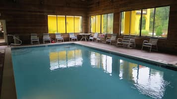 Indoor pool, outdoor pool, open 9 AM to 11 PM, sun loungers