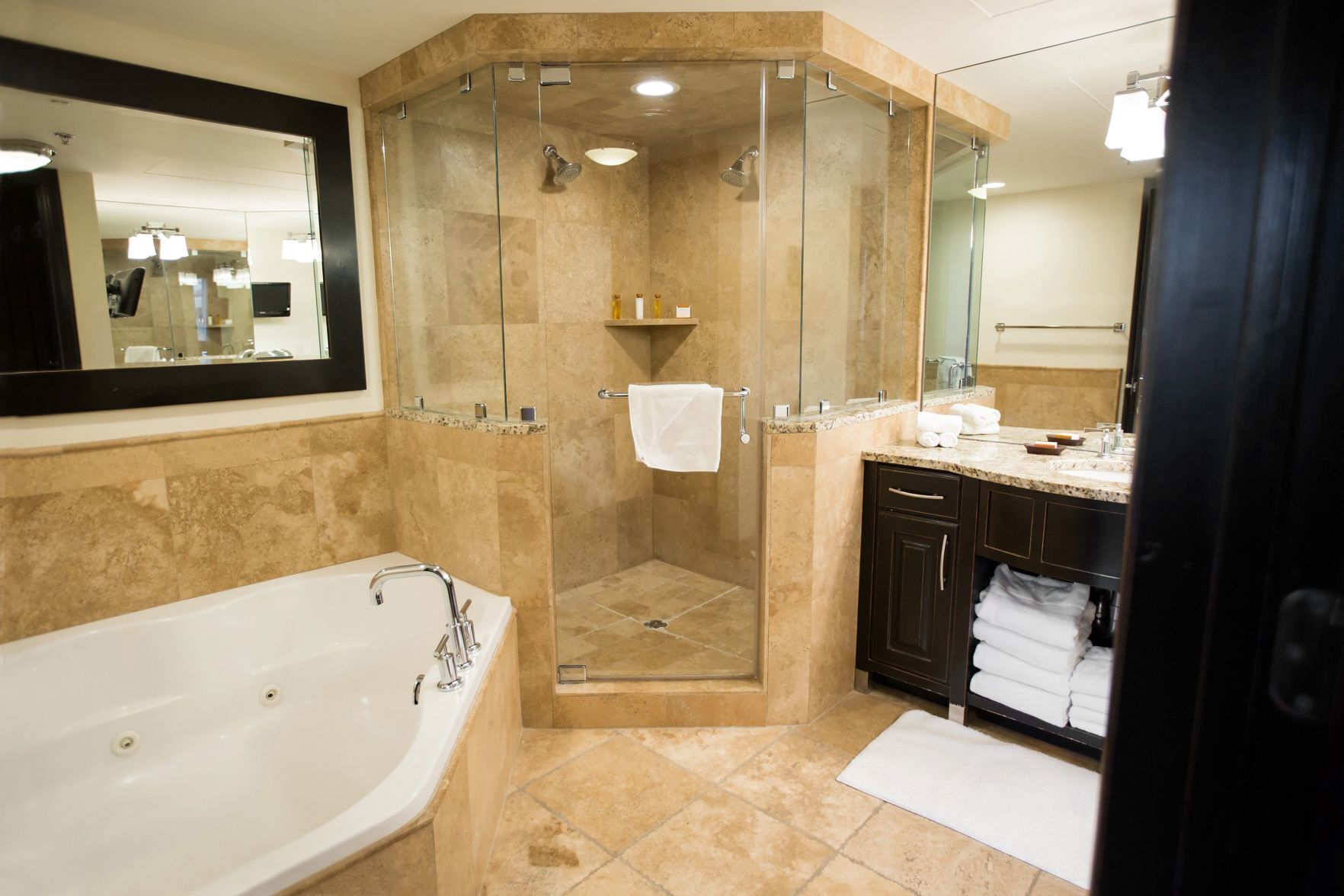 Bathroom | Jetted tub, designer toiletries, hair dryer, bathrobes