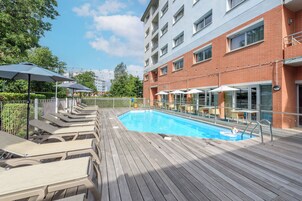 Outdoor pool, open 9:00 AM to 9:00 PM, sun loungers