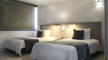Hypo-allergenic bedding, pillow-top beds, in-room safe, desk