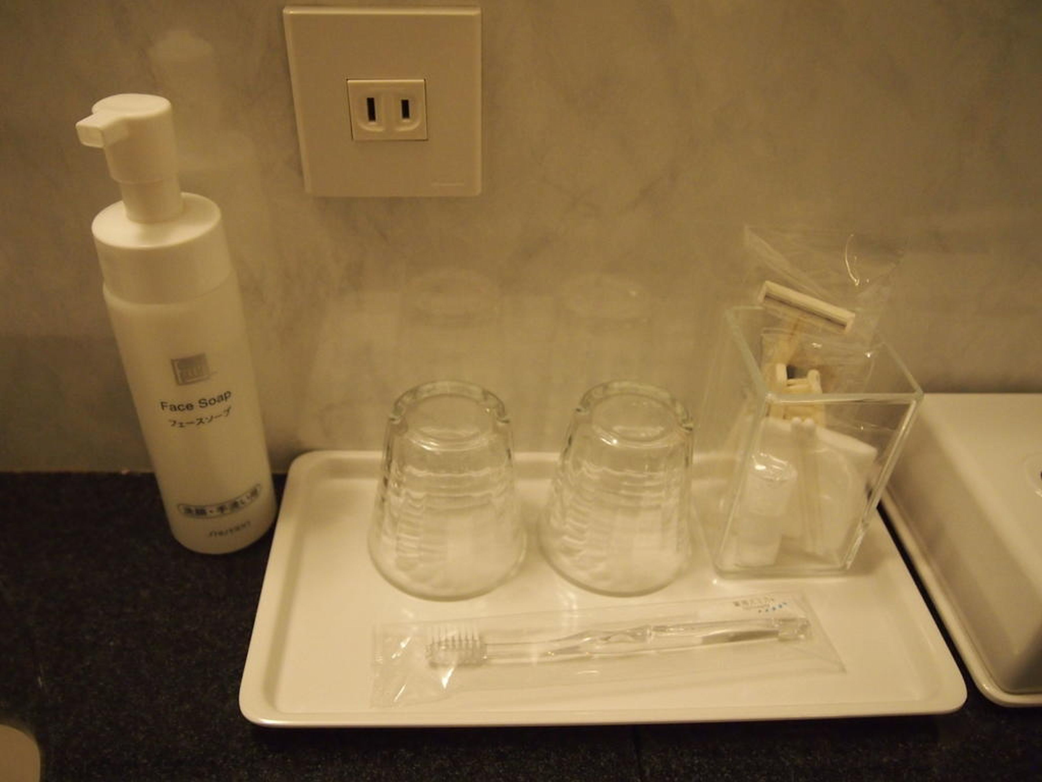 combined shower/bathtub, free toiletries, hair dryer, slippers