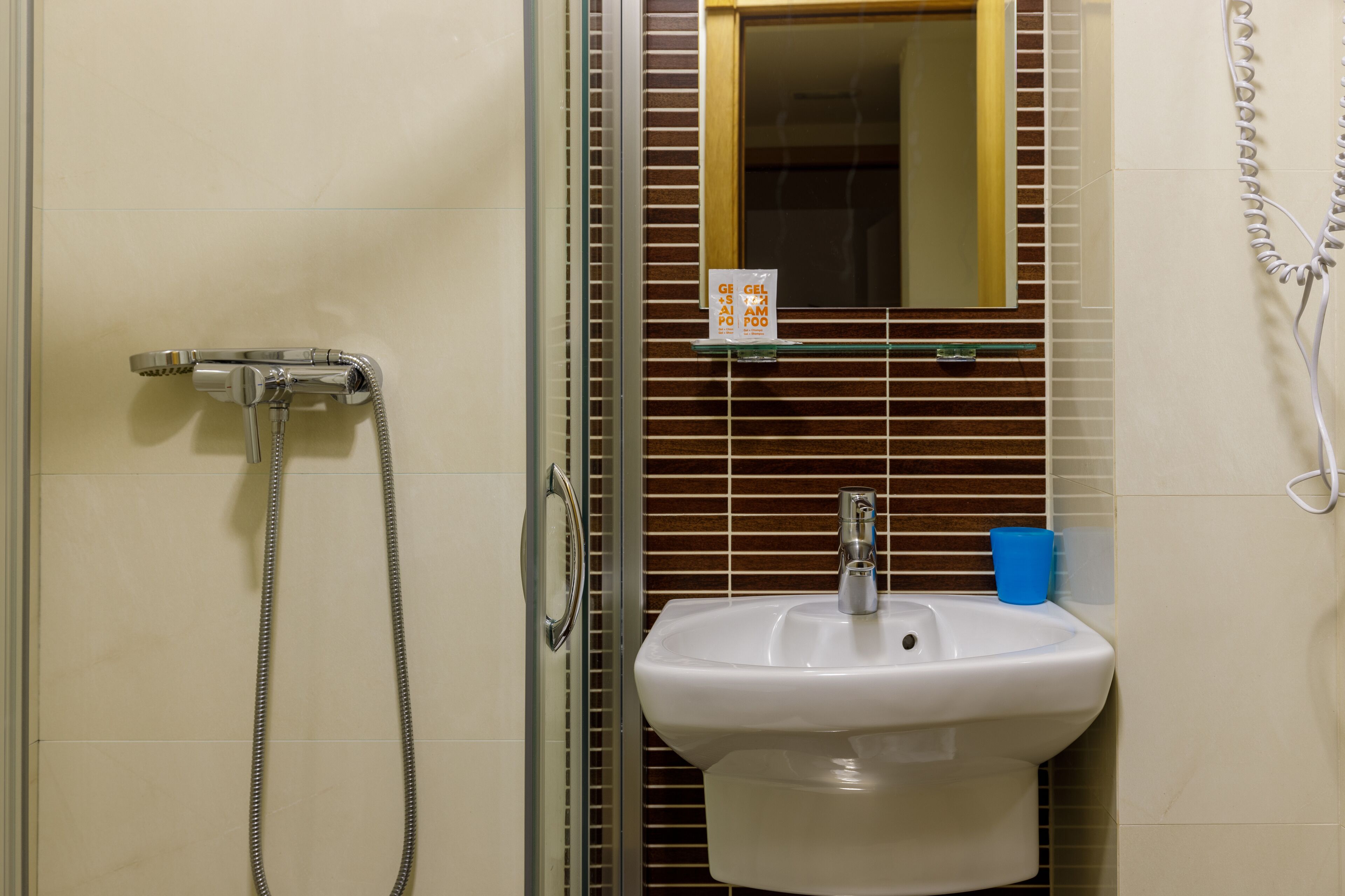 shower, free toiletries, hair dryer, towels