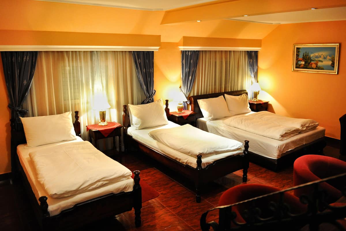 triple room, 3 single beds | 1 bedroom, premium bedding, minibar, in-room safe