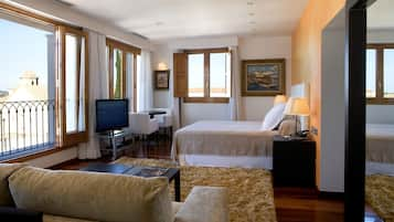 Suite, Sea View (Bath with jets) | Minibar, in-room safe, desk, laptop workspace