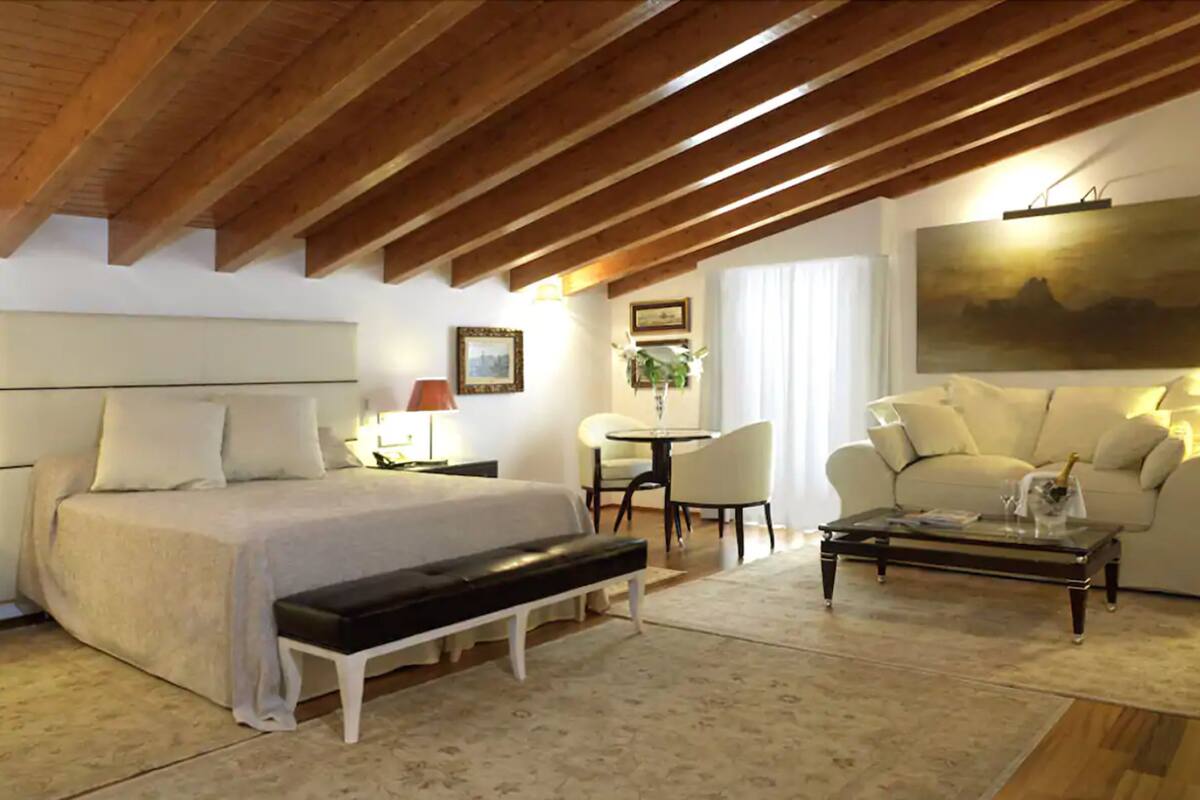 junior suite (bath with jets) | living area | 50-inch flat-screen tv with satellite channels, tv, netflix