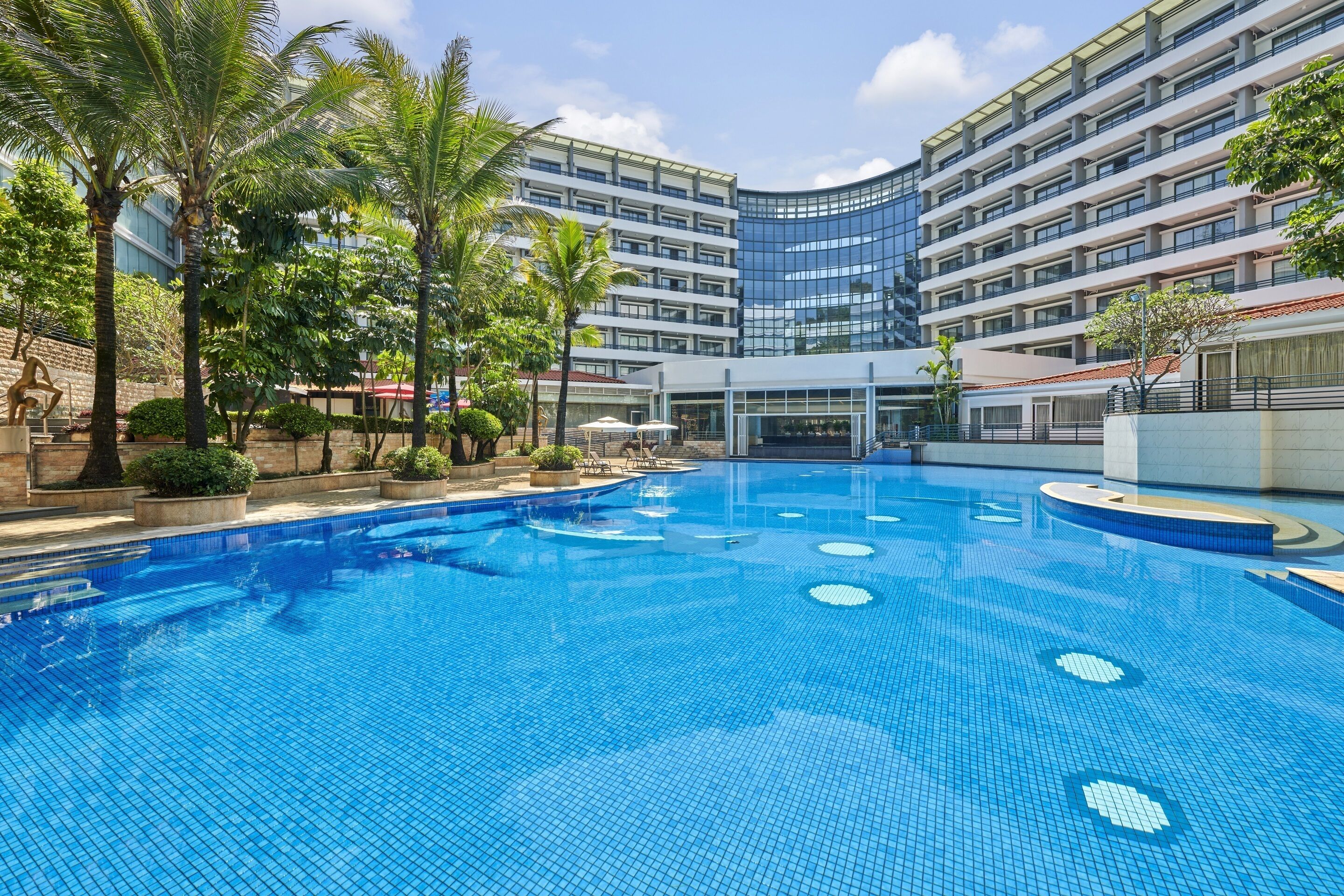 indoor pool, outdoor pool, pool umbrellas, lifeguards on site